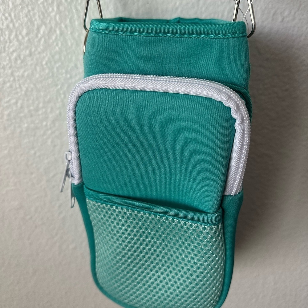 Teal Bottle Sleeve Or Crossbody Multi Purpose Bag
Bottle Holder BNWT - Picture 2 of 4